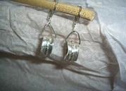 Dreh-Ohrringe mit gehämmertem Silber-Spielring